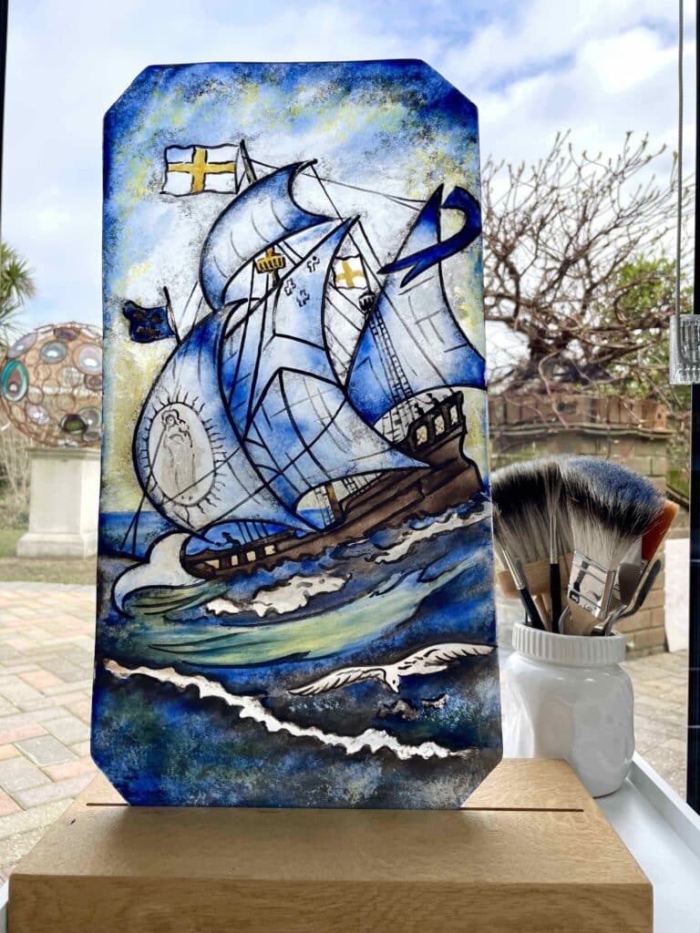 Replica of old galleon stained glass panel that was broken.